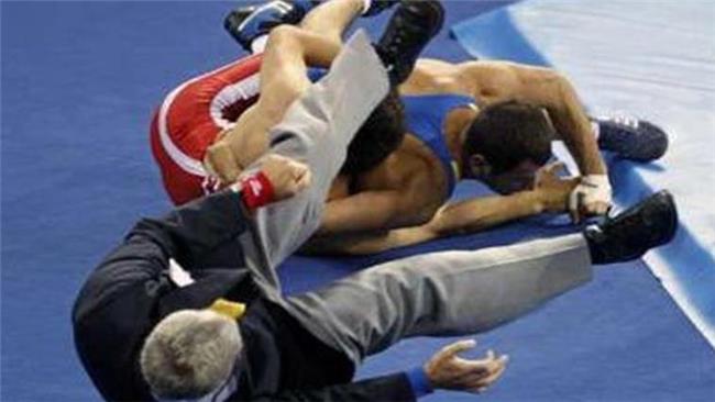 دود کمبود بودجه فدراسیون کشتی به چشم داوران رفت